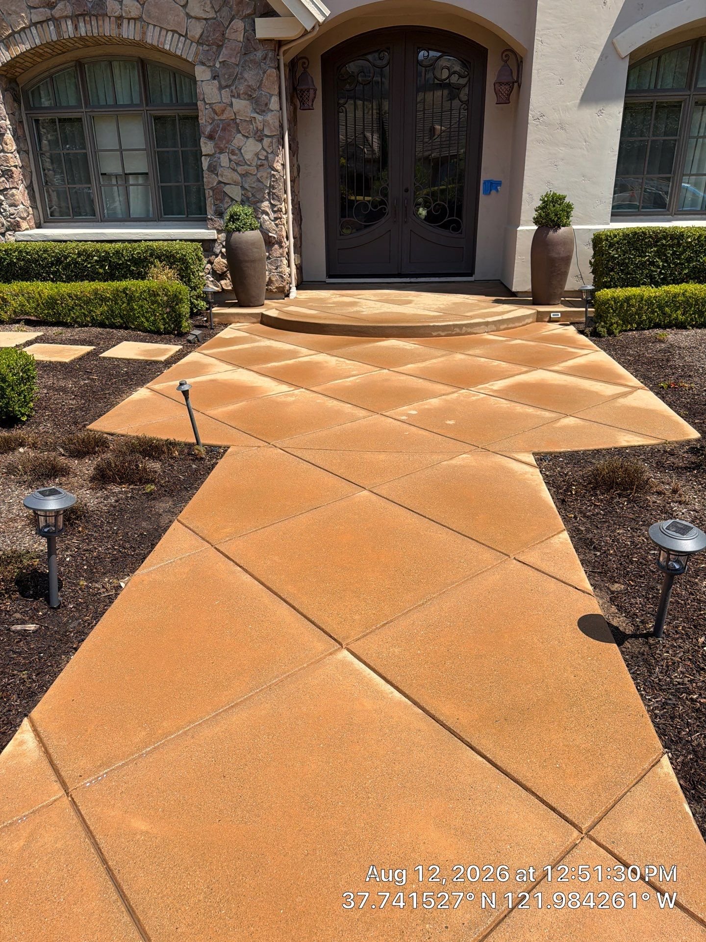 Pressure washing concrete in Concord