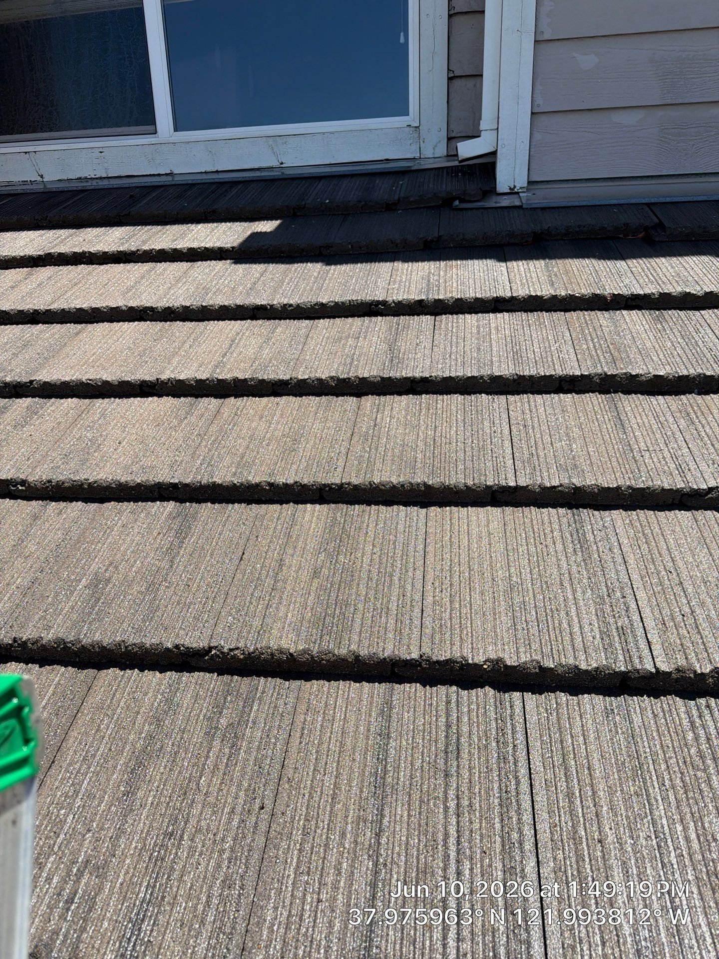 Soft washing a house exterior in Concord