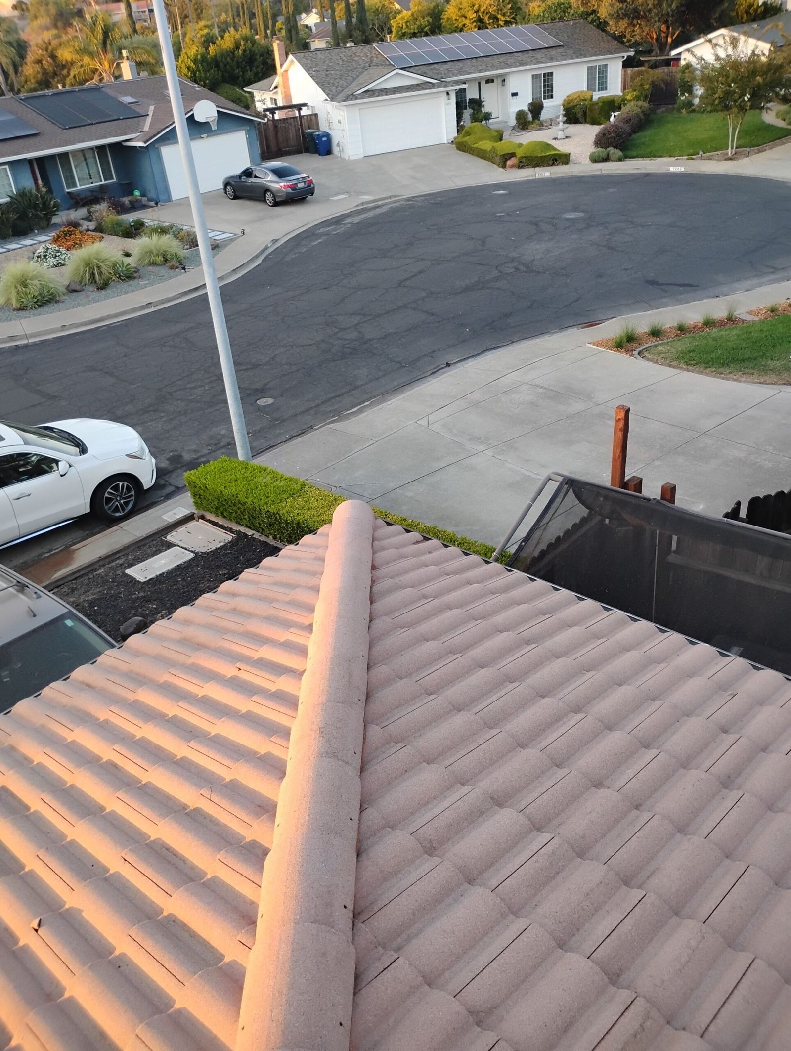 Roof soft washing on a Concord home